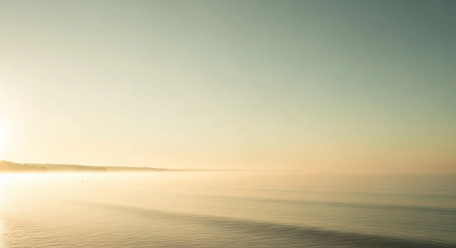 Calm sunrise over a still sea — the peace of life beyond anxiety